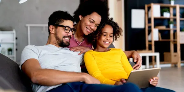 Family watching computer